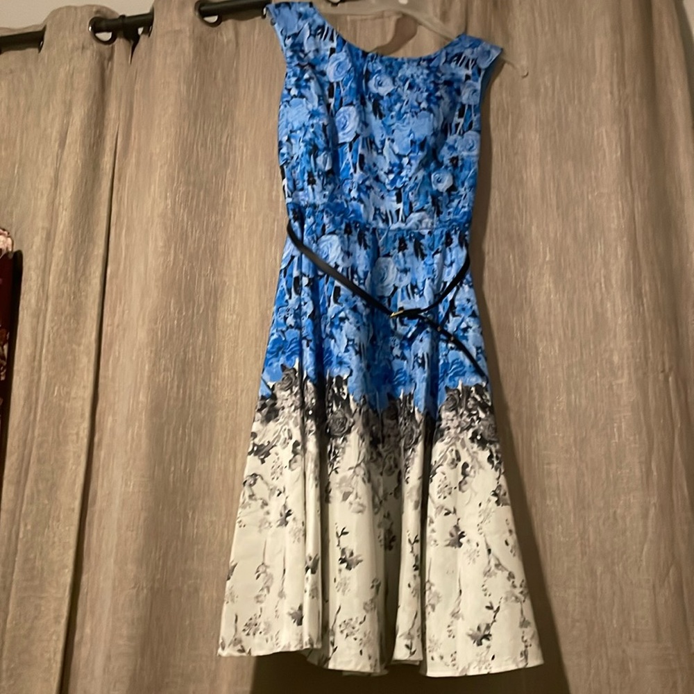 Beautiful floral blue dress. I wore it for Easter last year!